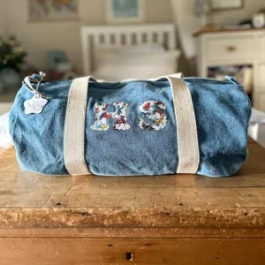 Double initial barrel bag.