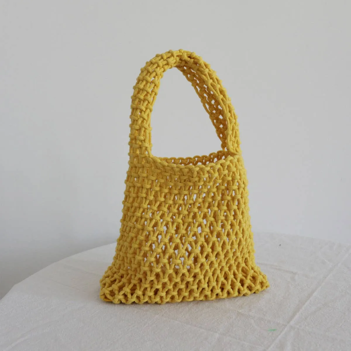 SOLID COLOR HOLLOW MESH WOVEN BUCKET BAG_CWAB1989: Black / (OS) 1
