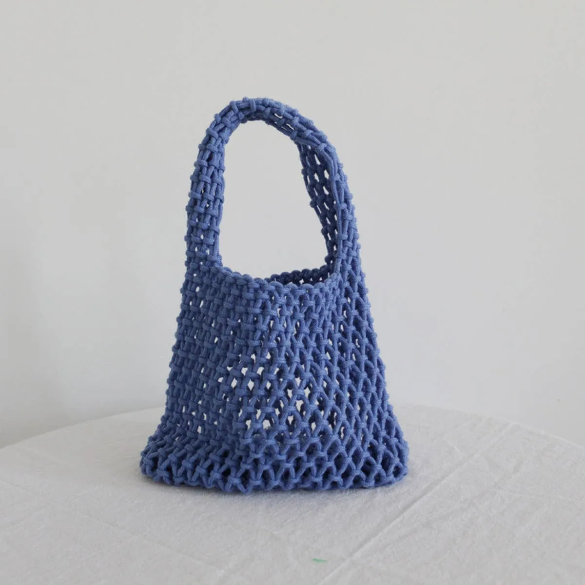 SOLID COLOR HOLLOW MESH WOVEN BUCKET BAG_CWAB1989: Black / (OS) 1