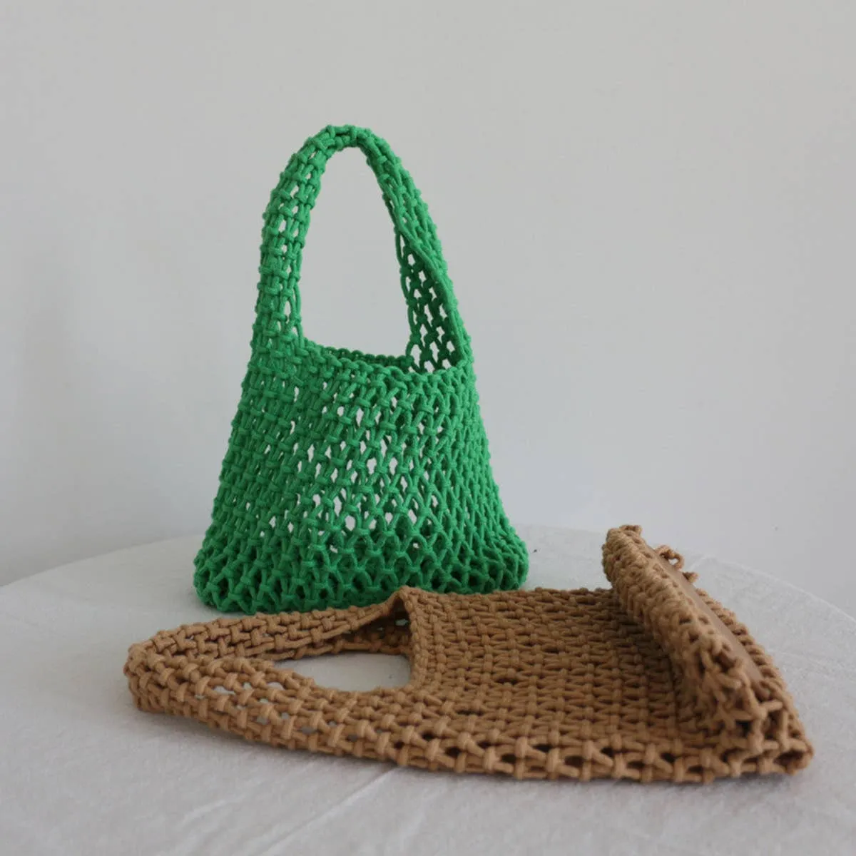 SOLID COLOR HOLLOW MESH WOVEN BUCKET BAG_CWAB1989: Black / (OS) 1
