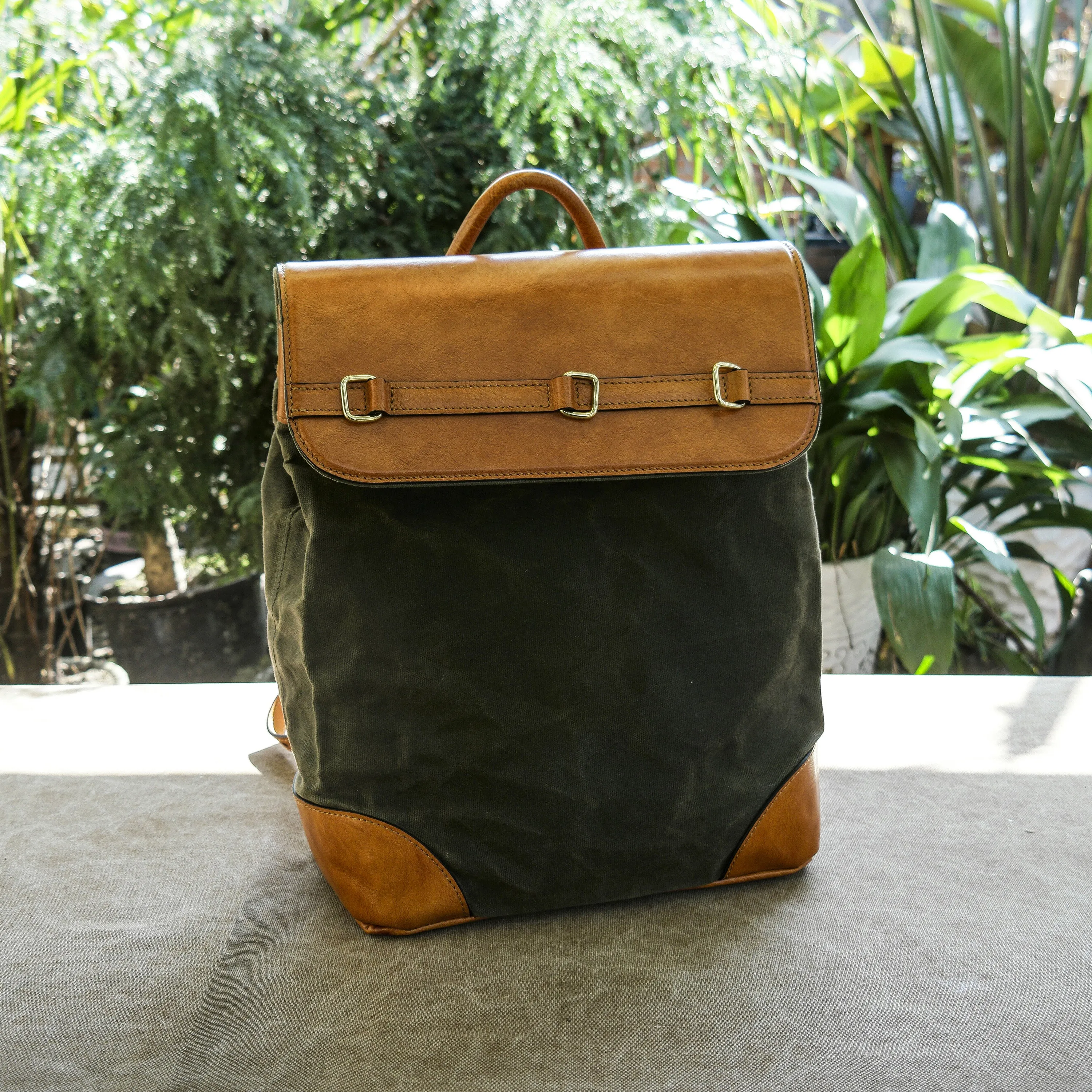 Waxed canvas and vintage leather city backpack