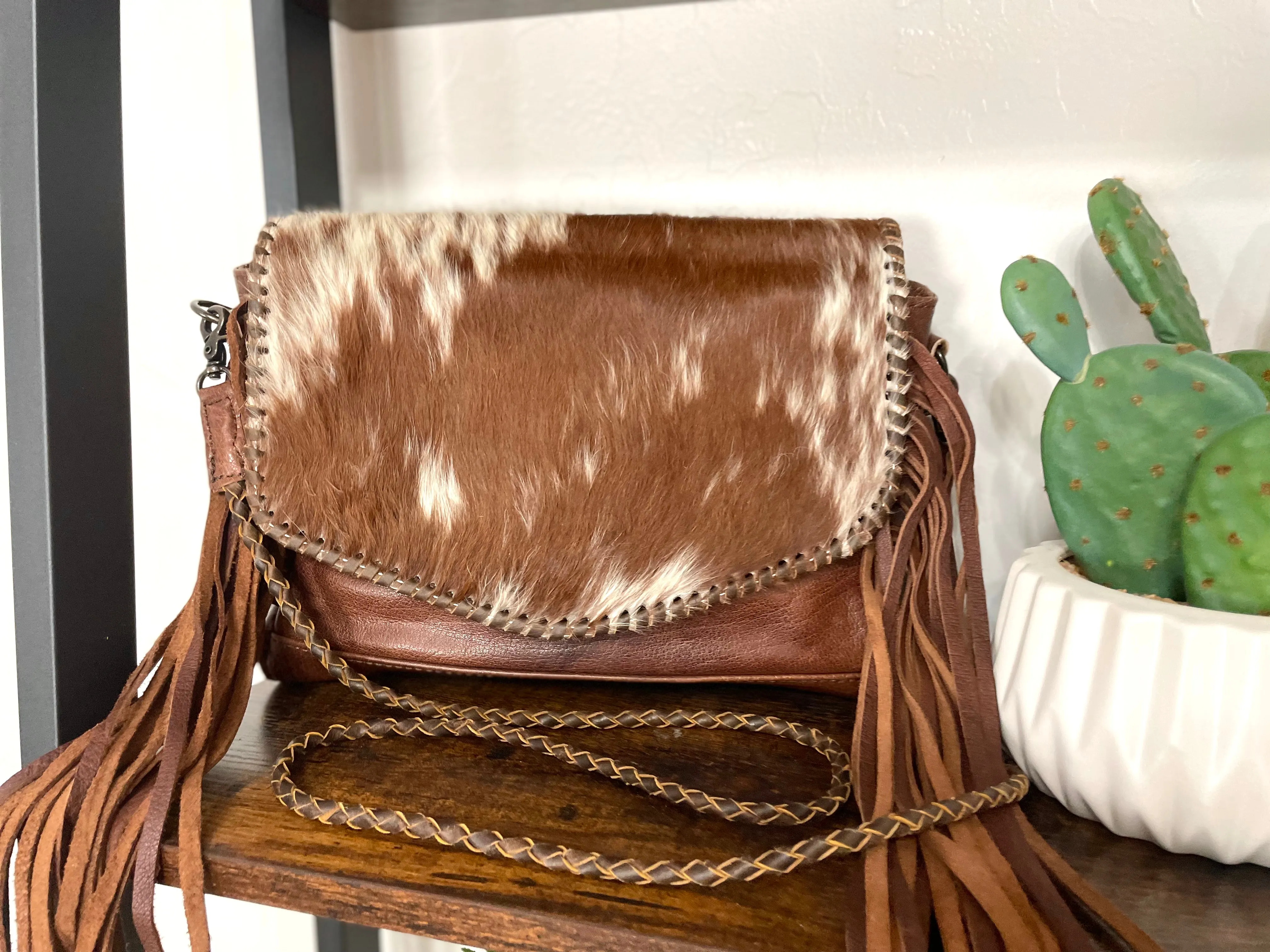 Whipstitched Hide Envelope Braided Crossbody Bag