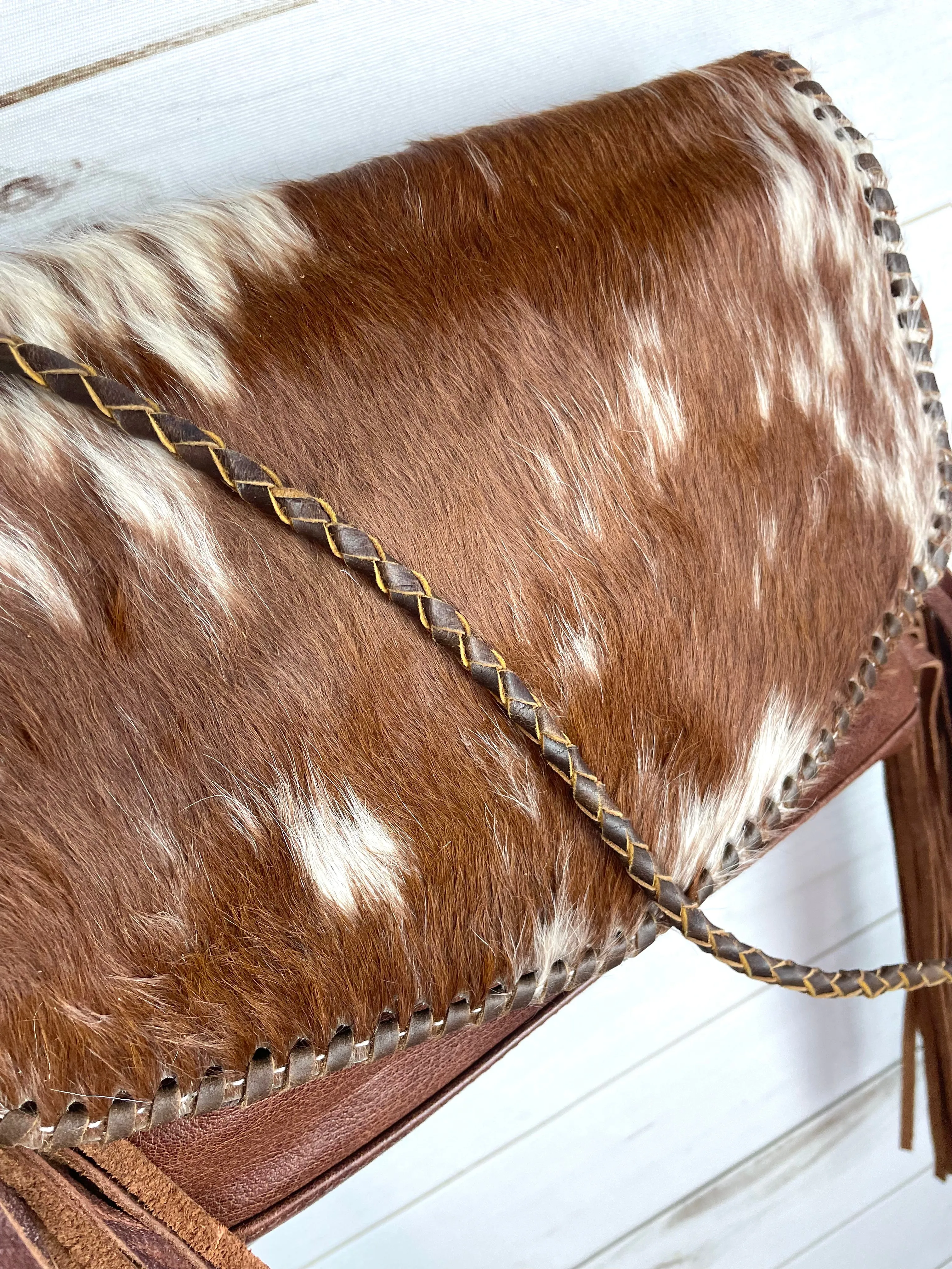 Whipstitched Hide Envelope Braided Crossbody Bag